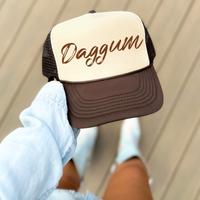 Daggum Western Script in Brown Digital Design, PNG
